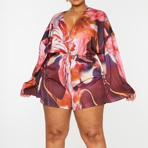 Selling this romper, it was way too big for me. It’s a size 26 (4-5x)